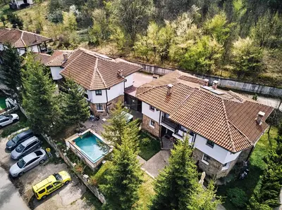 an aerial view of a house with a pool at Вълеви Къщи in Chiflik