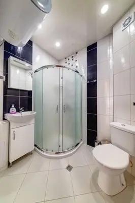 a bathroom with a shower and a toilet and a sink at Apartment Yana- The Amazing View in Smolyan