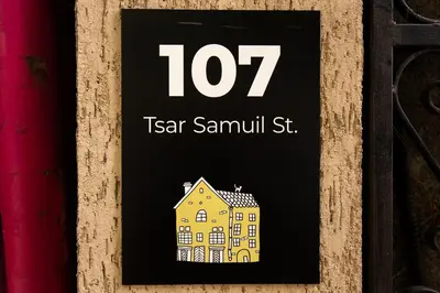 a sign for a house with a house at Nova Guesthouse - Private En-Suite Rooms I Sofia Center I Self Check-In in Sofia
