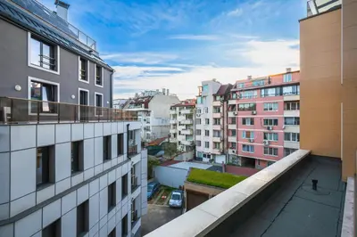 an apartment balcony with a view of buildings at Modern and Central 1BD Flat with Balcony by Flat Mаnager in Sofia