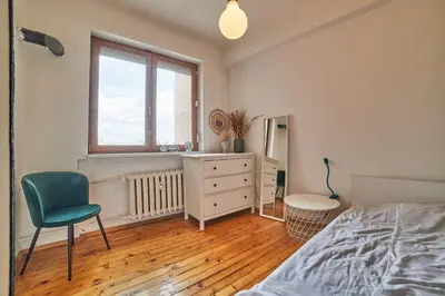 a bedroom with a bed and a desk and a chair at Main Street Sunshine 2 KING Bdr in Sofia