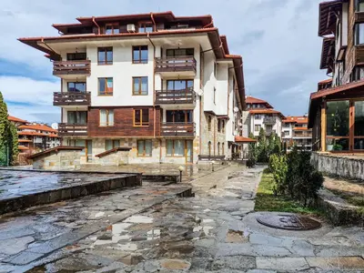 an empty street in front of a building at Cedar Lodge 2 Bedroom Apartment by Flat Mаnager in Bansko
