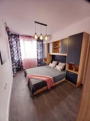 a bedroom with a large bed in a room at Luxury Apartment two bedrooms Paul Sеzanne in Hisarya
