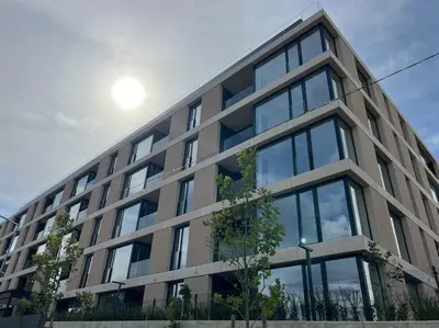a large building with a lot of windows at Cozy Elegant 2BR Apt + Free Parking next to Paradise Mall in Sofia