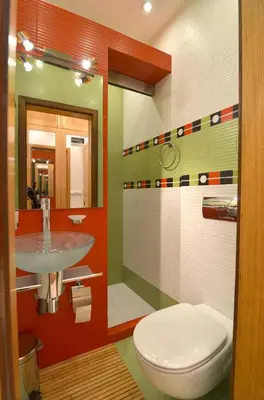 a bathroom with a white toilet and a sink at City Sunrise in Sofia