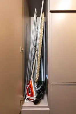 a bunch of hockey equipment in a closet at Central Victoria Home 2-bedroom apt in Plovdiv