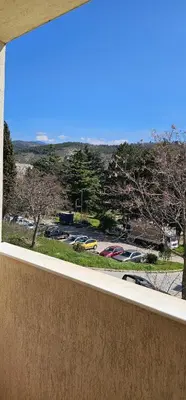 a view from a window of a parking lot at Д и В 3 - D & V 3 Apartment in Sandanski