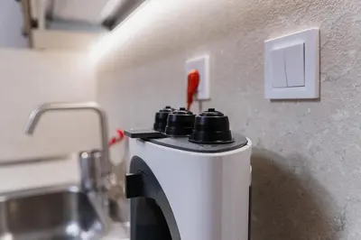 a coffee maker with a red top in a kitchen at Cozy 2-bed Apartment in Plovdiv
