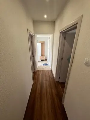 an empty hallway of an empty house with a hallway at Къща за гости Горски рай in Smilyan