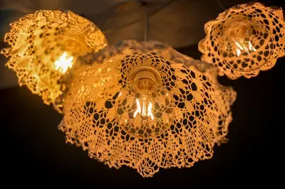 a white chandelier hanging from a ceiling at SOTS apART in Sofia center in Sofia