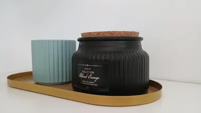 a jar of black jam on a wooden plate at Modern Comfort near Airport, The Mall, TechPark by KeyBox in Sofia