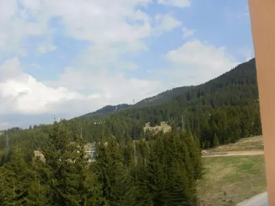 a mountain view from the window of a train at Deluxe Room in Stoykite in Pamporovo