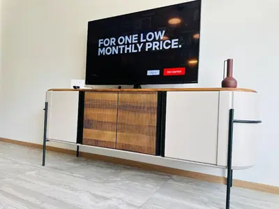 a flat screen tv sitting on top of a tv stand at 15% Discount! Limited Time in Sofia
