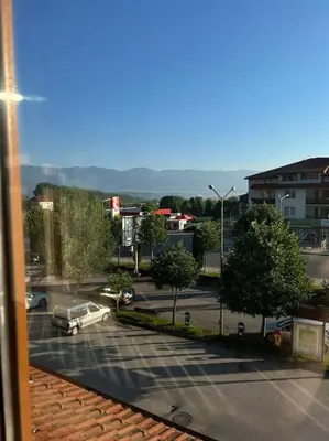 a view of a parking lot with a car parked at Apartment Danik River Glaznel in Bansko