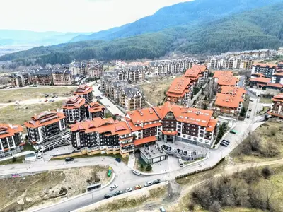 an aerial view of a large building with orange roofs at Cozy apartment in luxury SPA resort St Ivan Rilski Bansko -free wellness & parking- in Bansko