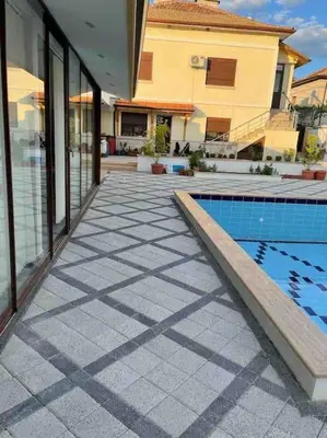 a house with a swimming pool in front of a house at Boris House 5 bed Villa & Private Pool in Strumyani