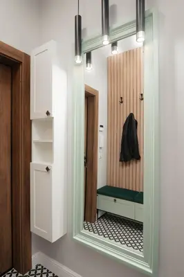 a mirror in a dressing room with a green bench at Brand New 2 bdr Luxury Apartment in Top Centre in Sofia