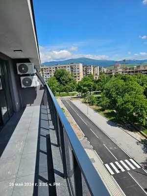 a view of a street from a balcony of a building at Dilyanka 2 in Pernik