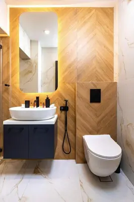 a bathroom with a sink and a toilet and a mirror at Sunset 2BR Apartment Central Street PARKING Included in Plovdiv