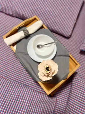 a plate with a fork and a knife on a table at Flower house 6 in Sofia