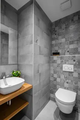 a bathroom with a white toilet and a sink at Elegant Escape in The Heart of The City by Flat Mаnager in Sofia