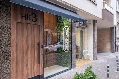 a store front with a large window with a sign on it at SOFapart Stylish & Fancy Place with 1 BDR in Sofia