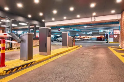 a parking garage with a bunch of parking meters at Dom Knipituga in Sofia