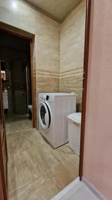 a washer and dryer in a small room at Апартаменти Недялкови I in Sandanski