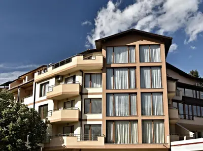 a building with balconies on the side of it at Апартамент Жери in Velingrad