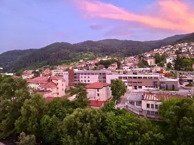 a view of a city with buildings and mountains at Апартаменти Лили in Devin