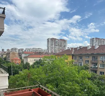 a view of a city with tall buildings and trees at Apartment11in the center of Sofia in Sofia