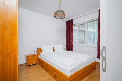 a bedroom with a bed and a window at 1BD flat with Desk on Russian Monument Square by Flat Mаnager in Sofia