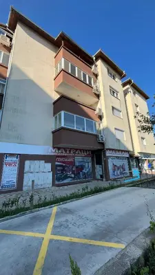an empty parking lot in front of a building at John Apartment 2 in Blagoevgrad