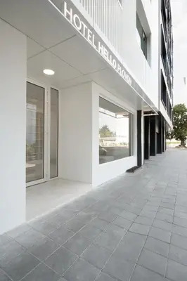 a facade of a building with a tiled sidewalk at Hotel Hello Plovdiv - Free Parking and Pet Friendly in Plovdiv