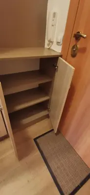 a closet with a cupboard and a door next to a floor at Blue sea in Sofia