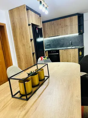 a table with three yellow mugs on top of it at Вила Данели in Tsigov Chark