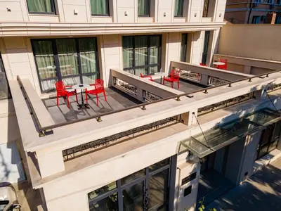 an overhead view of a building with red chairs and a table at Aurora Sofia in Sofia