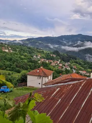 a view of a town with mountains in the background at Вила Леска in Leska