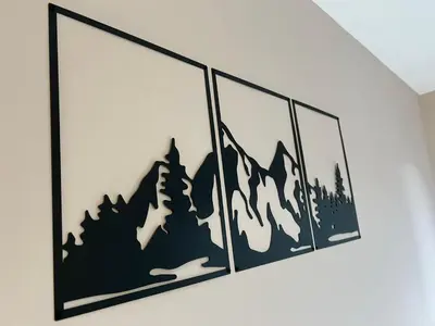 a set of three framed silhouettes of mountains on a wall at Bojurland Apartment, Bansko in Bansko