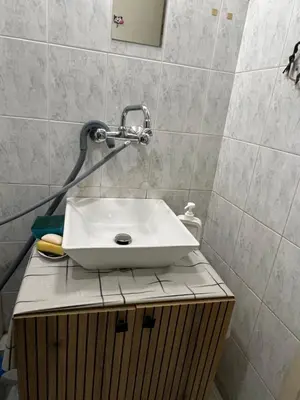 a white sink on a counter in a bathroom at Cheep&Free on the Ground floor and Pets friendly in Sofia