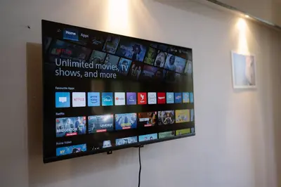 a flat screen tv hanging on a wall at Sofia Centre with Free on-site Parking in Sofia