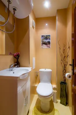 a bathroom with a toilet and a sink at Sofia Centre with Free on-site Parking in Sofia