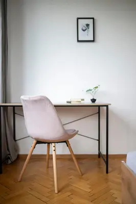 a white chair sitting in front of a desk at Black Peak Panorama central apartment in Sofia