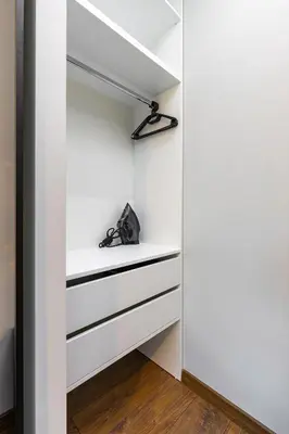 a closet with white drawers and a shelf at Happy People Plovdiv - Grey 1-BD Apartment by Flat Mаnager in Plovdiv