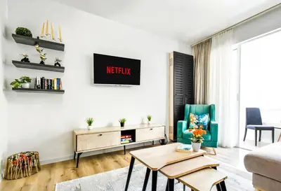 a living room with a couch and a table at Prime Spot for 5 Full Kitchen Wi-Fi AC in Sofia