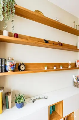 a shelf in a kitchen with wooden shelves at Luxury And Spacious Apartment at the Hearth of the City in Sofia