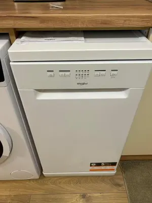 a white computer printer sitting under a desk at New & Stylish Apartment Axel with Mountain Views in Smolyan