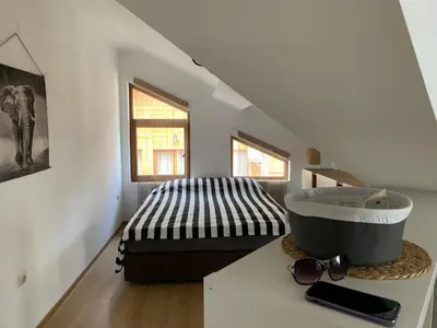 a bathroom with a sink and a tub on a counter at Mountain View in Razlog
