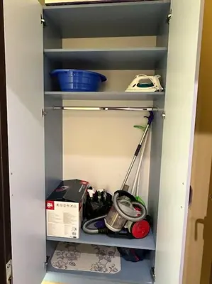 a cupboard with somecellaneouscellaneous items in it at Pirin Sky in Bansko