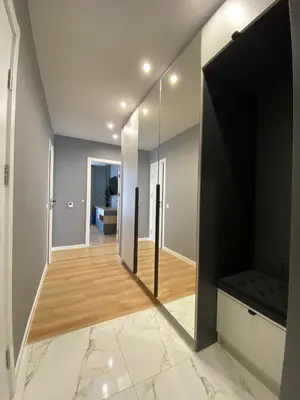 a hallway of a house with a mirror at Gran Capital - Vodolei Garden, FREE Parking in Sofia